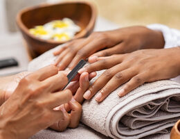 Hands getting a manicure